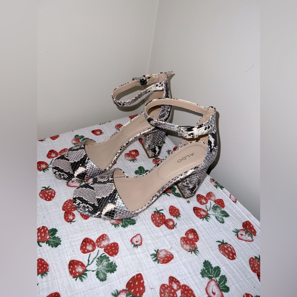 Also snakeprint low heels